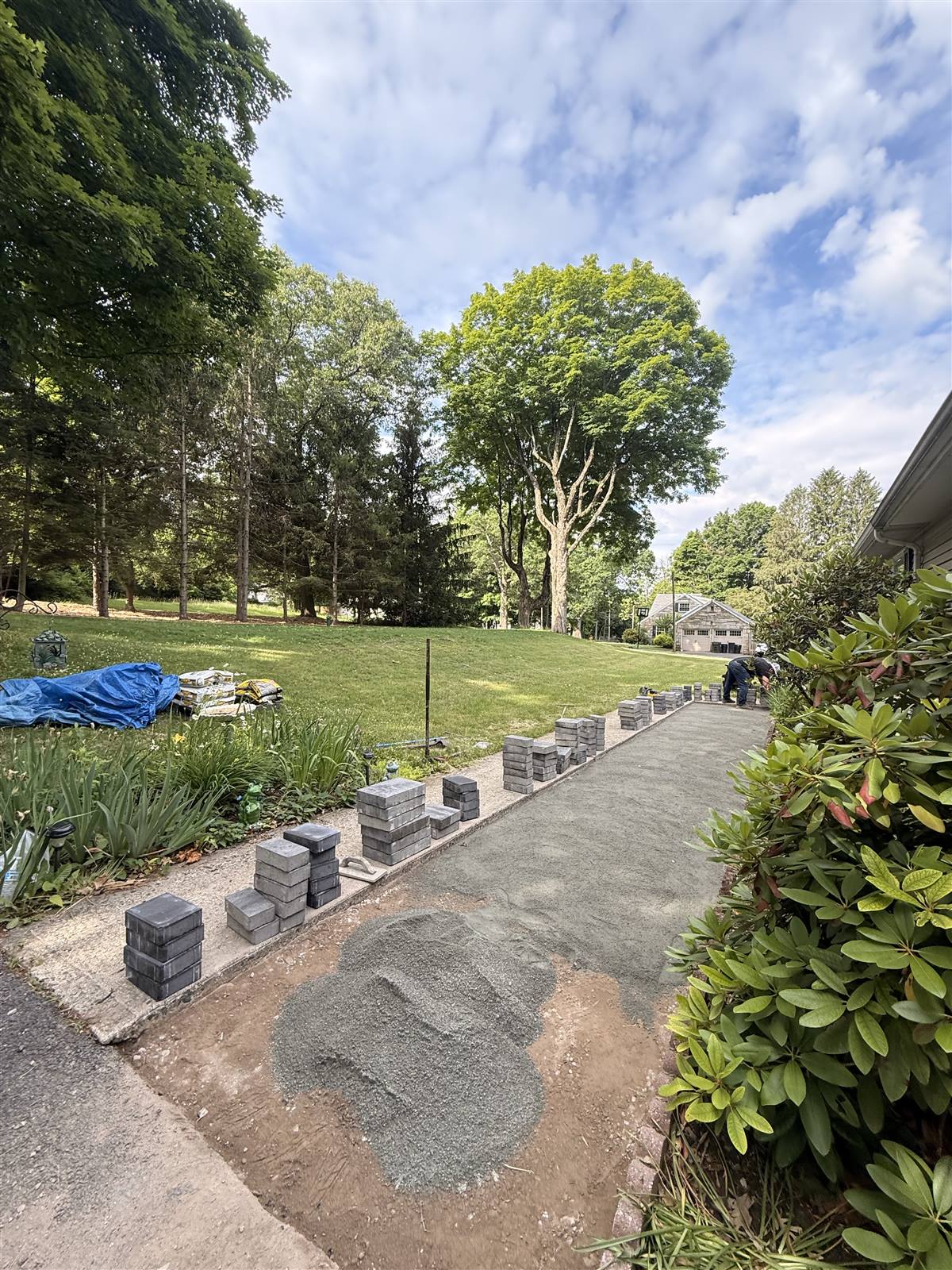 Before — gravel base with stacked pavers